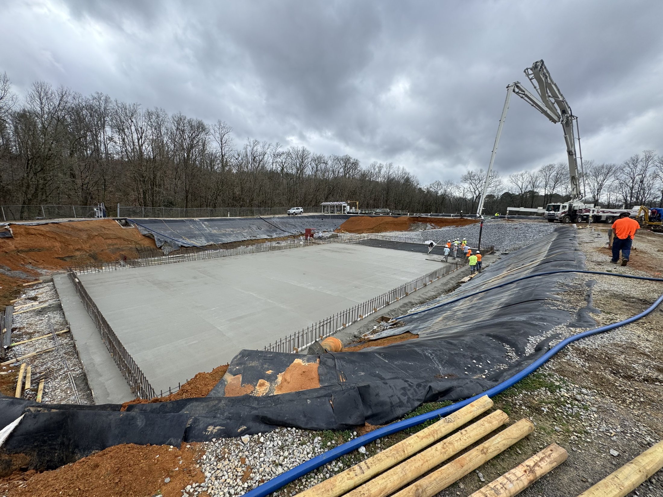 Large-scale concrete placement using a pump truck