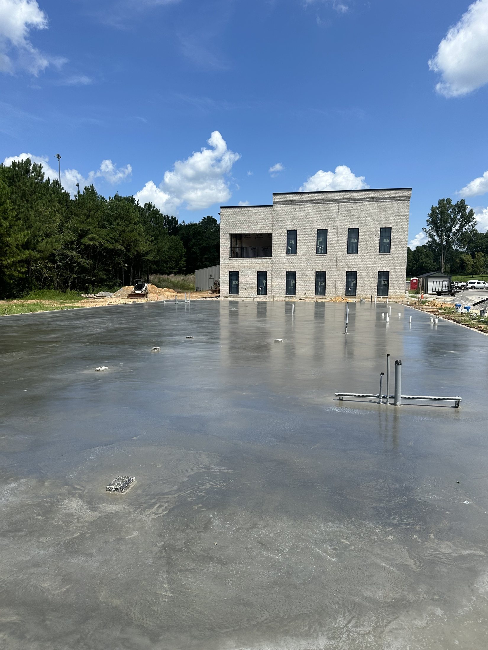 Commercial concrete slab in front of a multi-story building